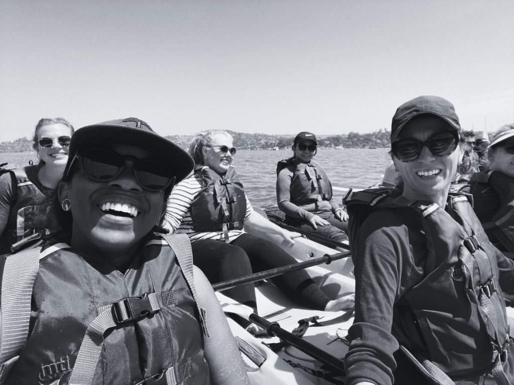 Staff kayaking at a team retreat